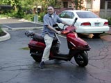 David showing off his Honda scooter